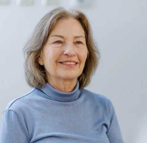 Older woman smiling — longevity biomarker testing at Liondale Medical