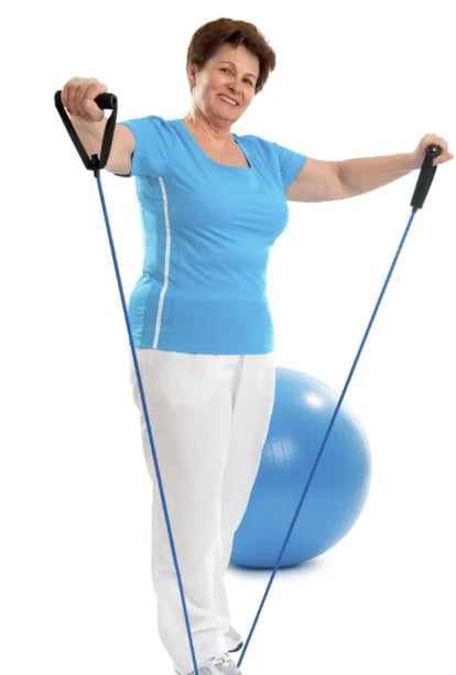 Older woman using resistance bands during a strength-training session